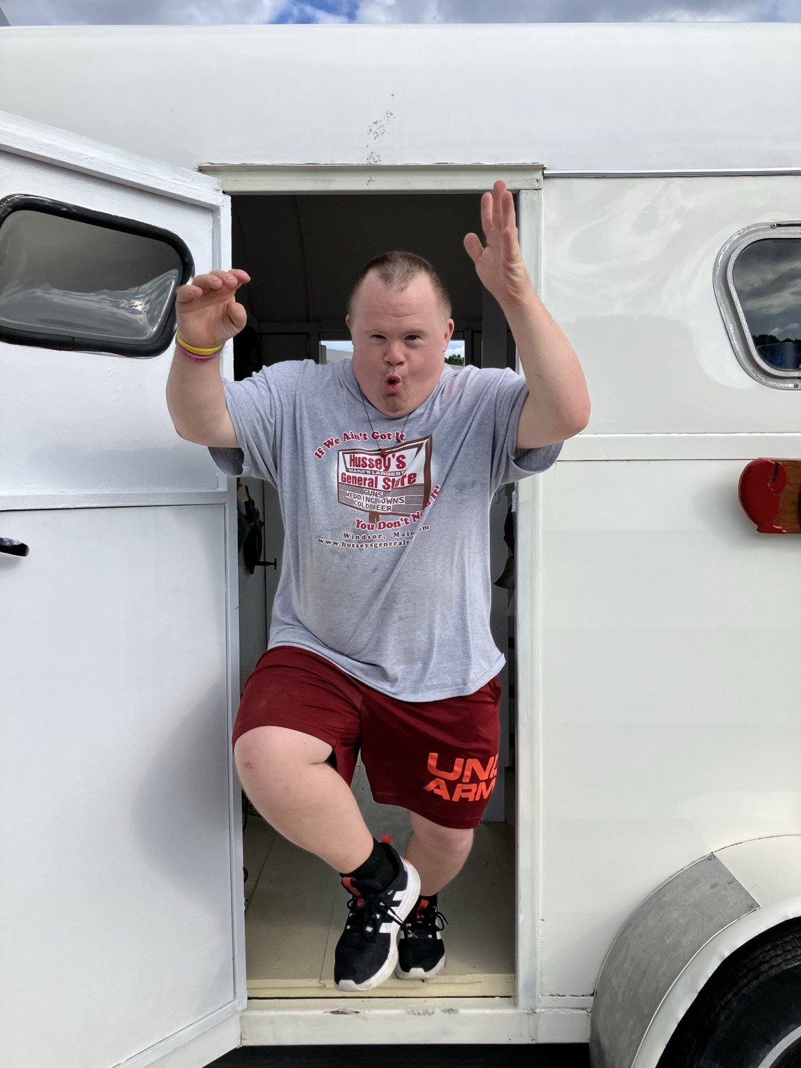 A joyful moment outside the Nauti Chandler trailer