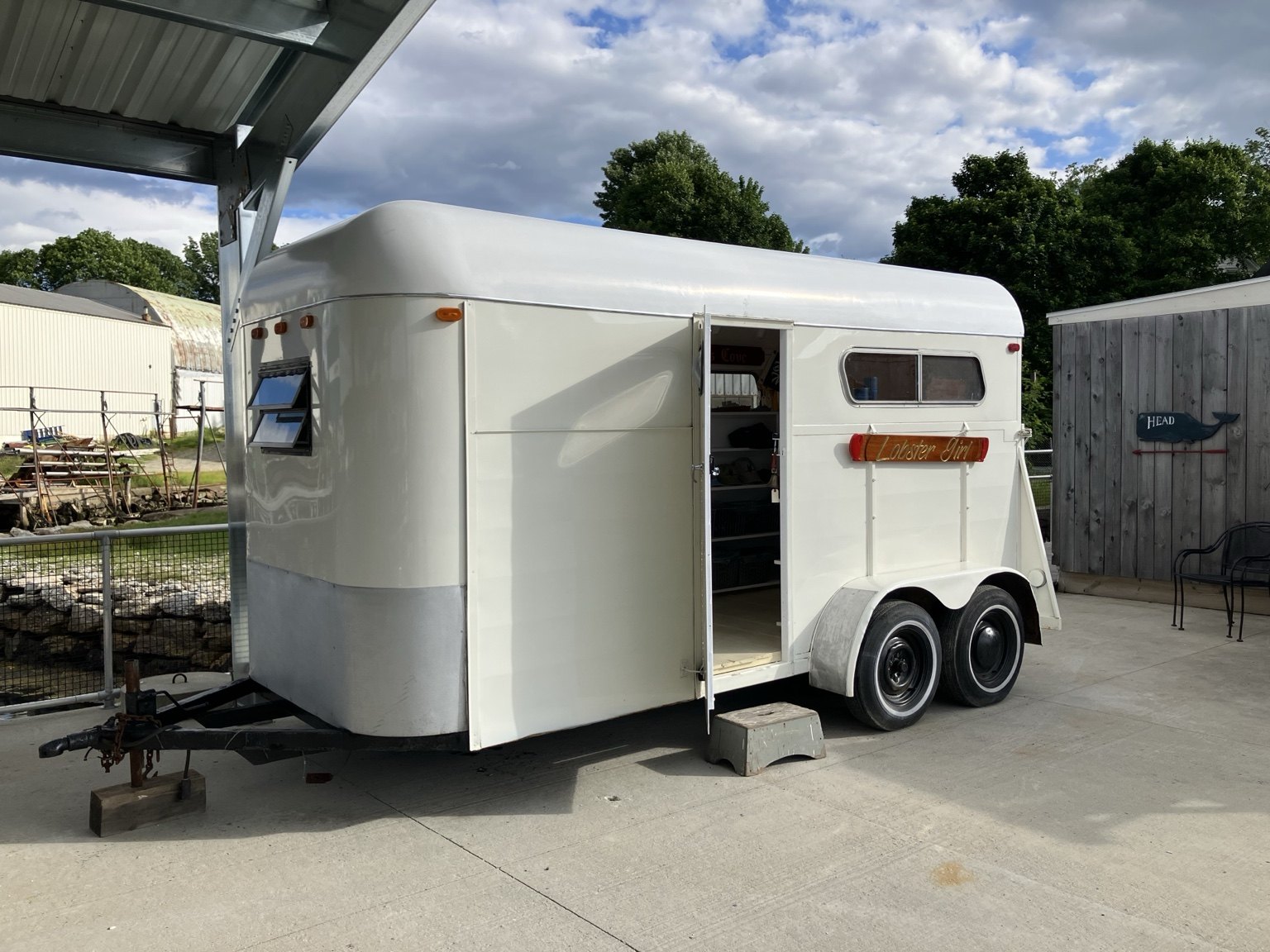 The Nauti Chandler shop trailer on the waterfront in East Boothbay, Maine