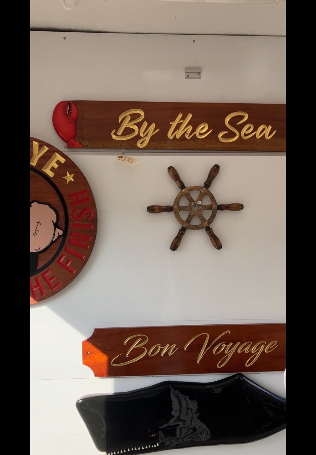 Handcrafted wooden nautical signs